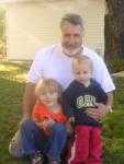 Photo of Dale Kitchen and grandkids.