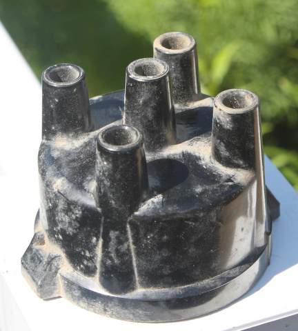 Photo of distributor cap from four-cylinder car.